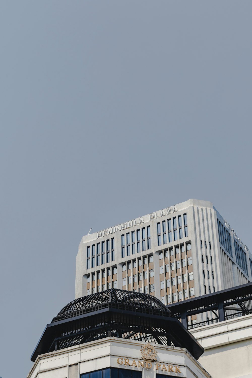 a tall building with a clock on the top of it