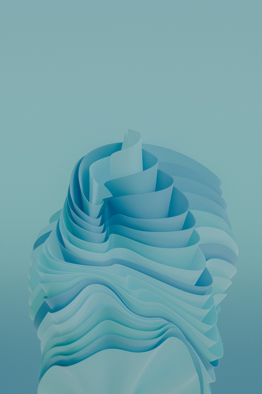 a blue abstract sculpture with wavy shapes