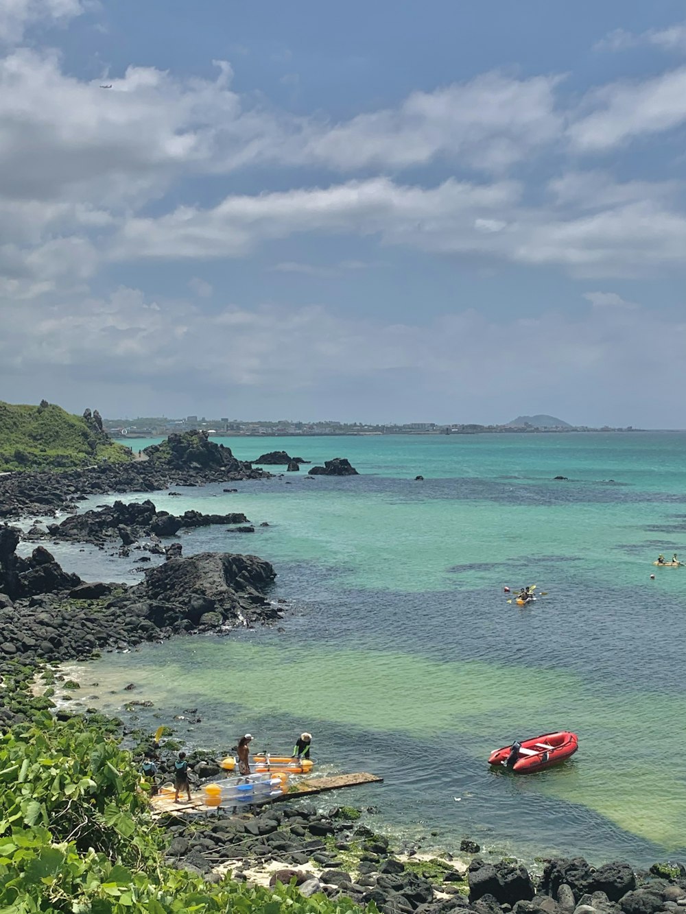 a group of people in a body of water