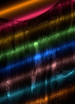 A vibrant resin artwork showcasing glossy textures and colors.