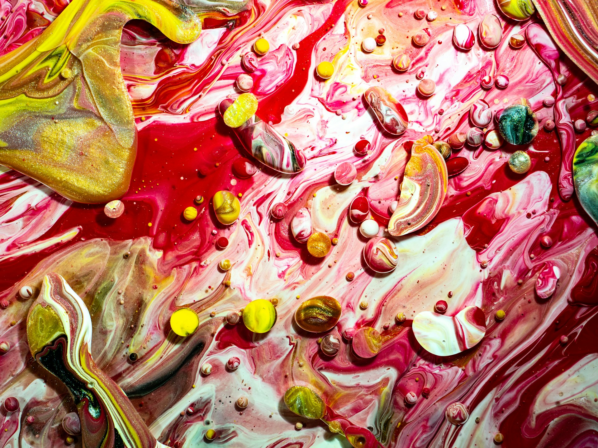 a close up of a painting with lots of colors