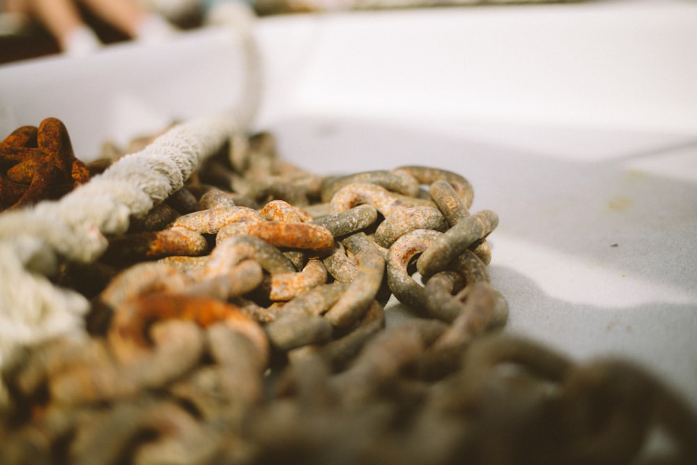 a close up of a bunch of chains on a table