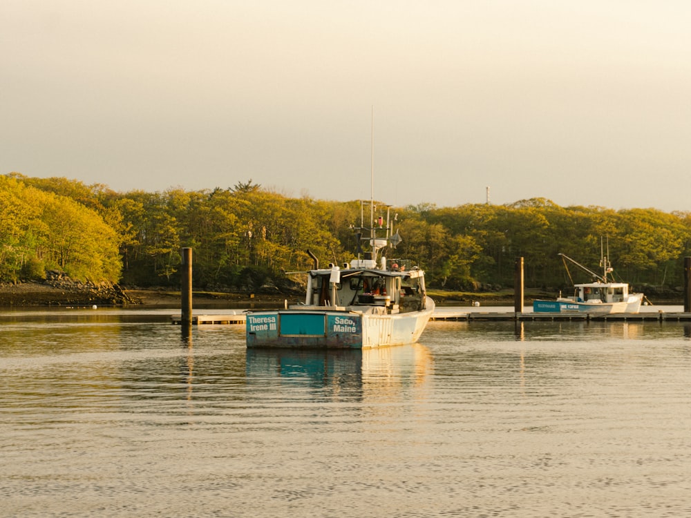 a couple of boats that are sitting in the water