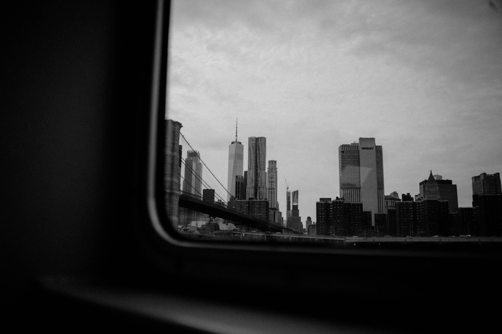a view of a city from a train window