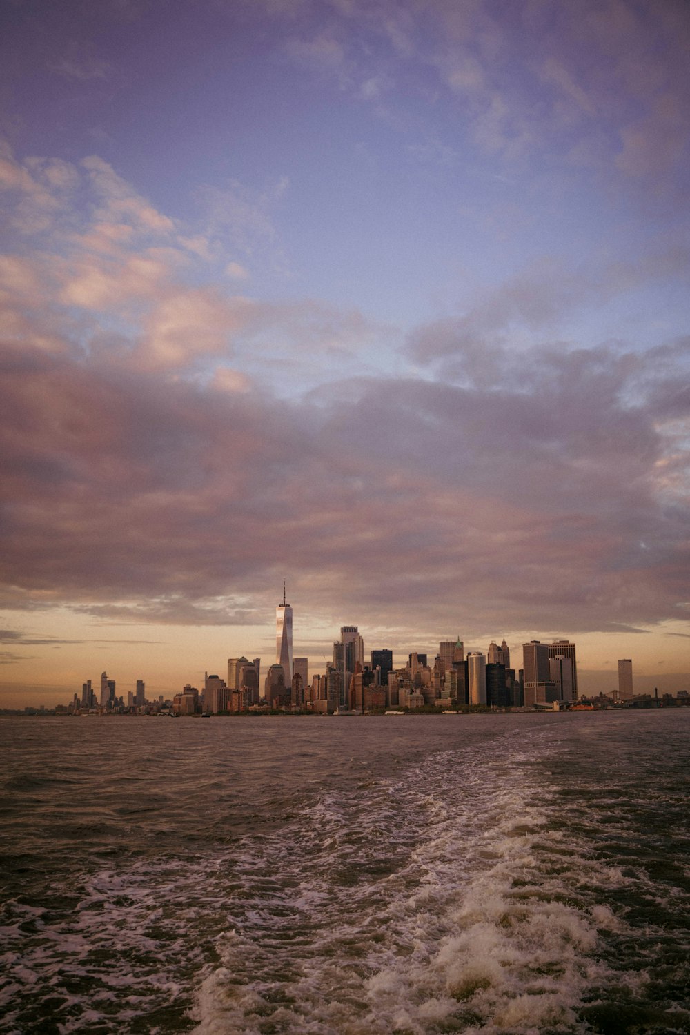 a view of a city from a boat on the water