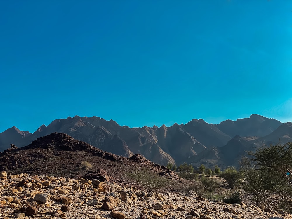 a view of a mountain range in the desert