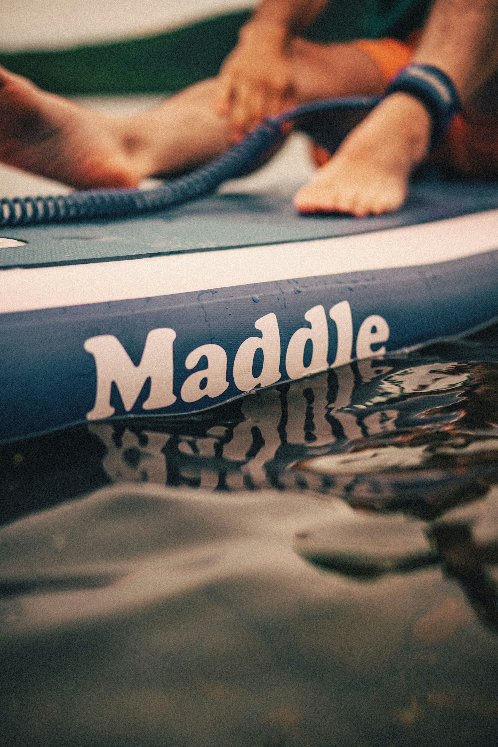 Close up shot of a Paddle Board on a lake. 