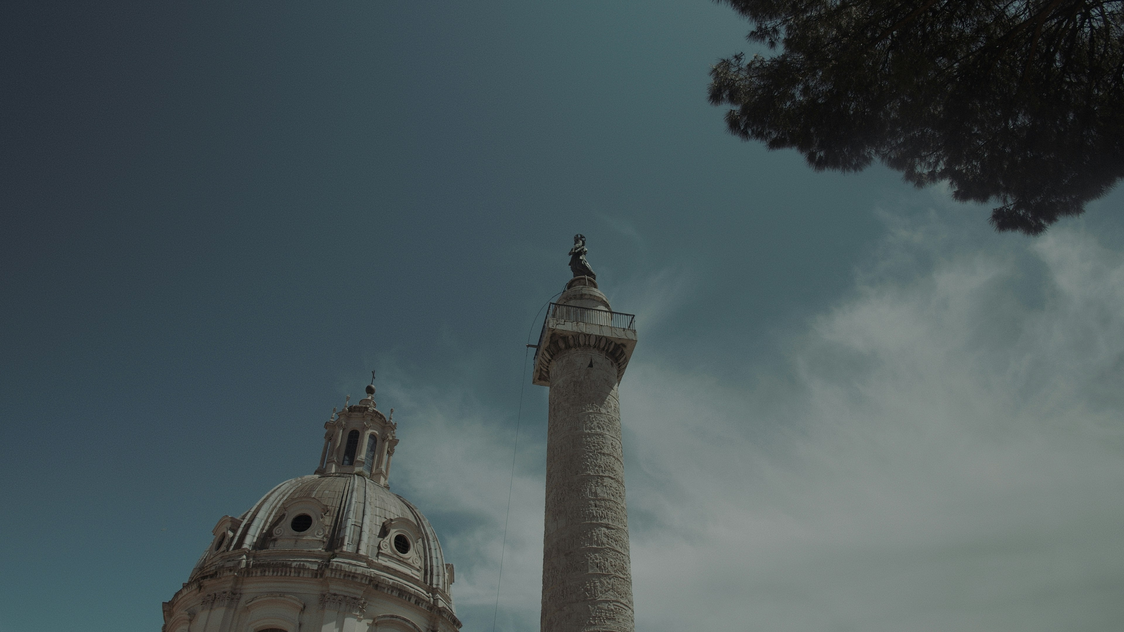 a tall tower with a clock on top of it