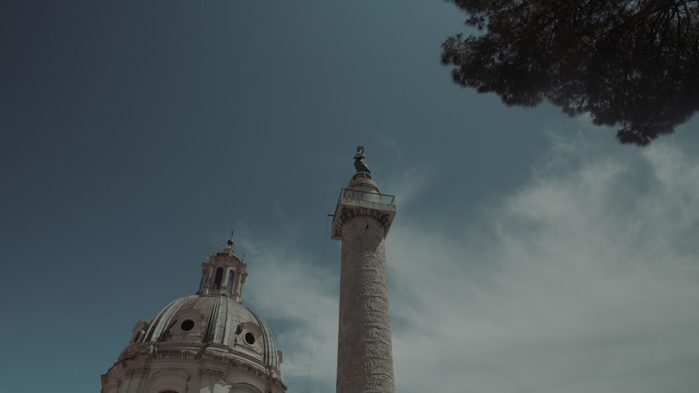 a tall tower with a clock on top of it