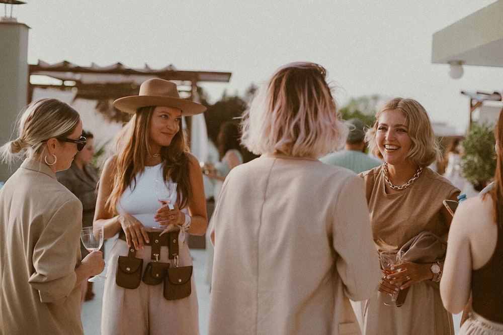 a group of women standing next to each other