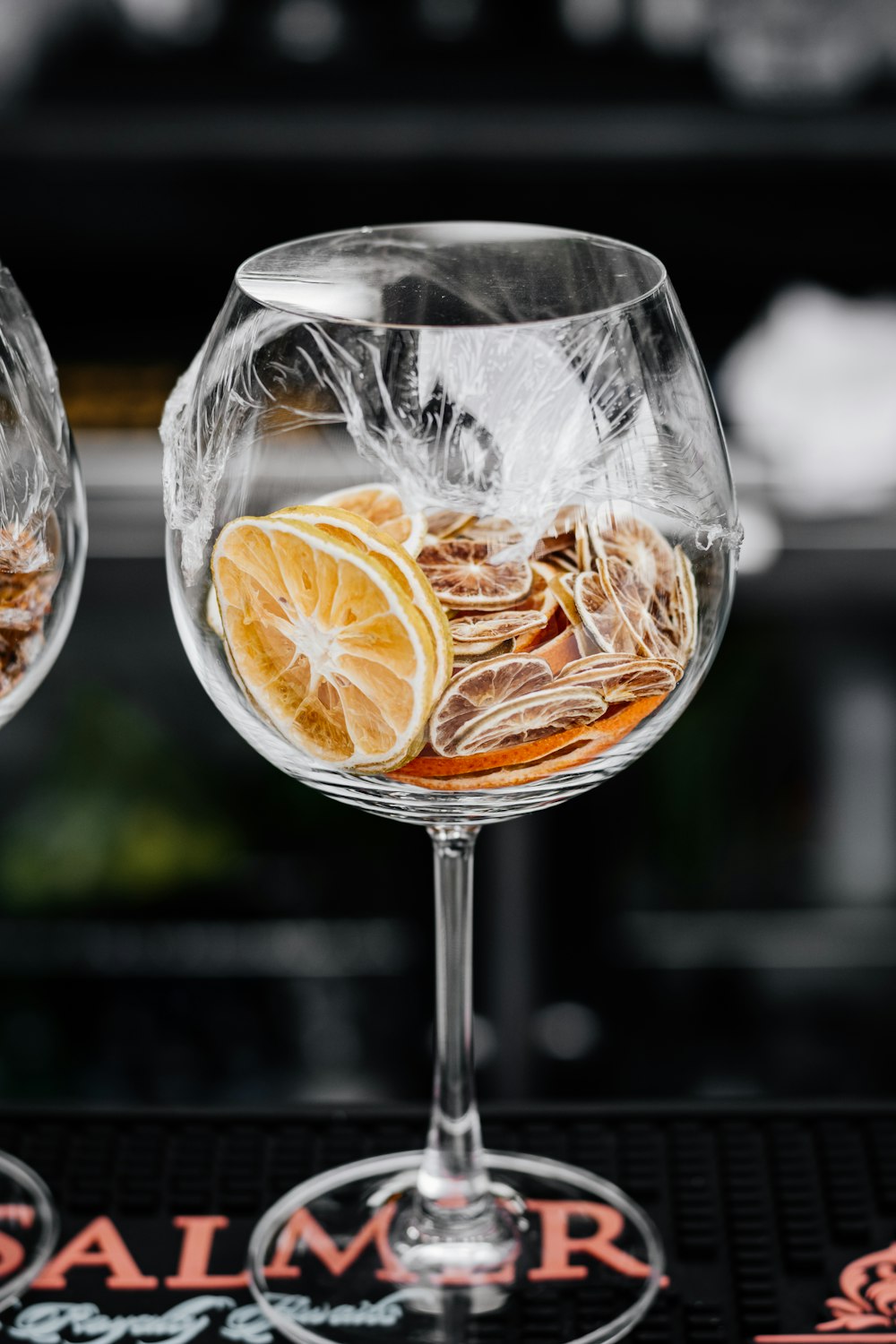 a couple of wine glasses sitting on top of a table