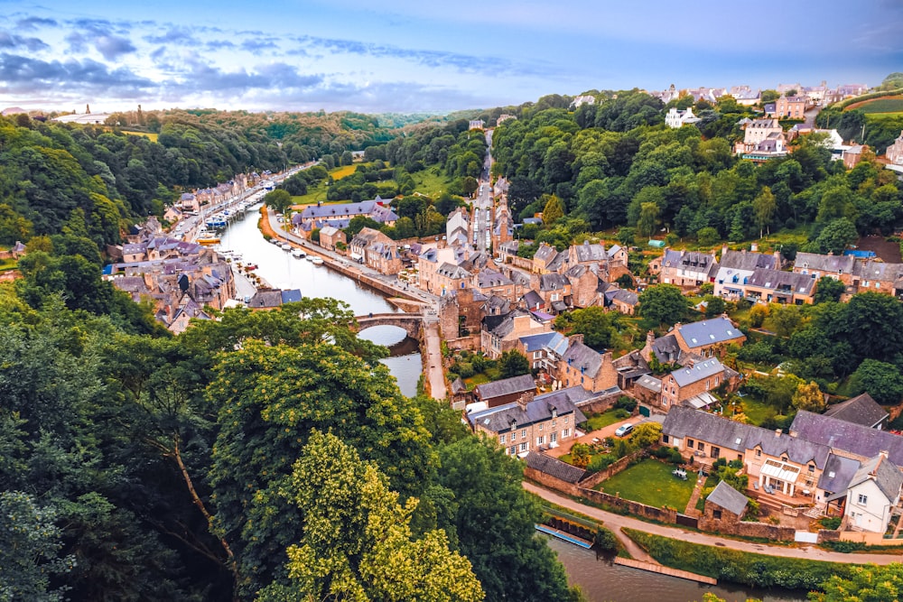 an aerial view of a town with a river running through it