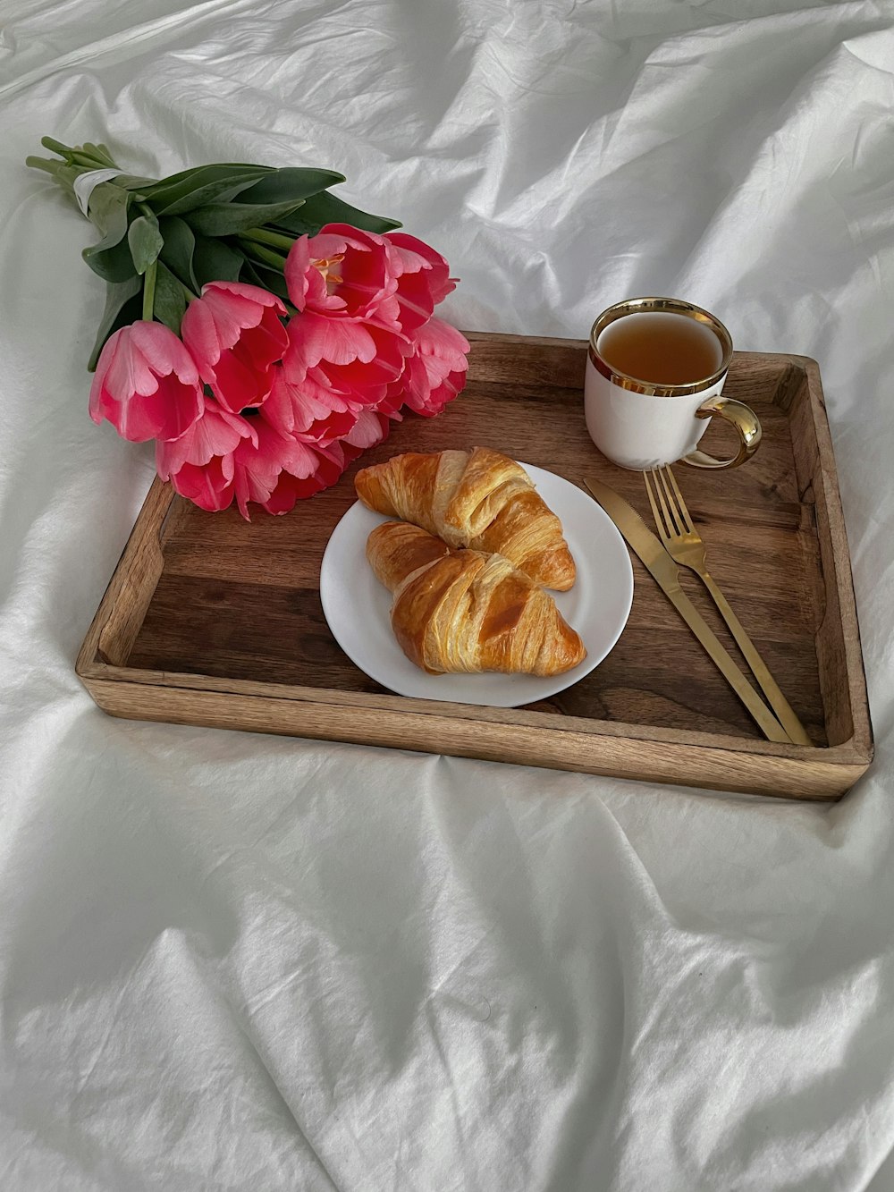 a plate of food and a cup of coffee on a table