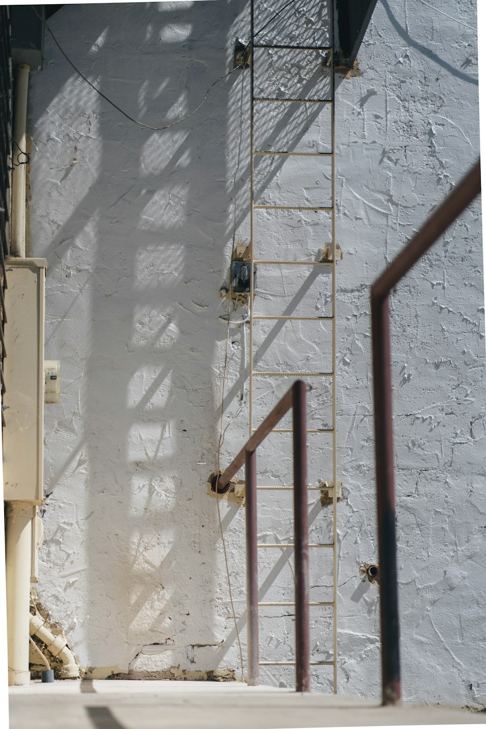 a ladder leaning against a wall