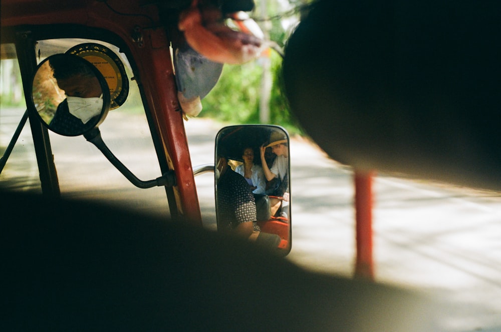 a person taking a picture of themselves in a mirror