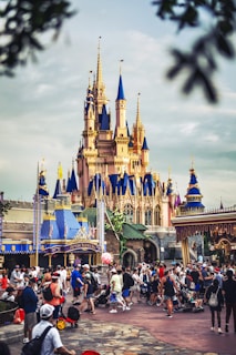 a castle with many people walking around