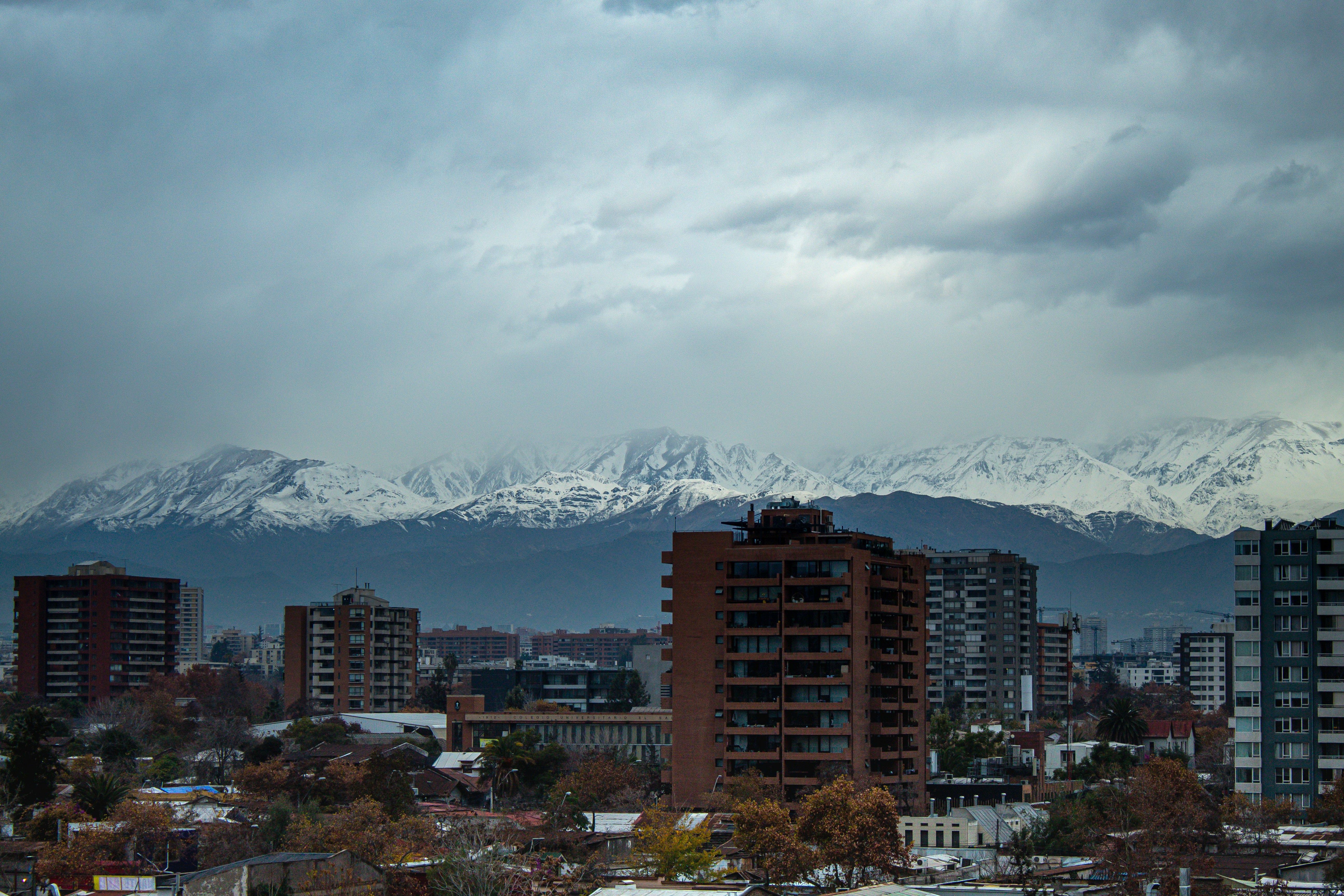 a city with mountains in the background