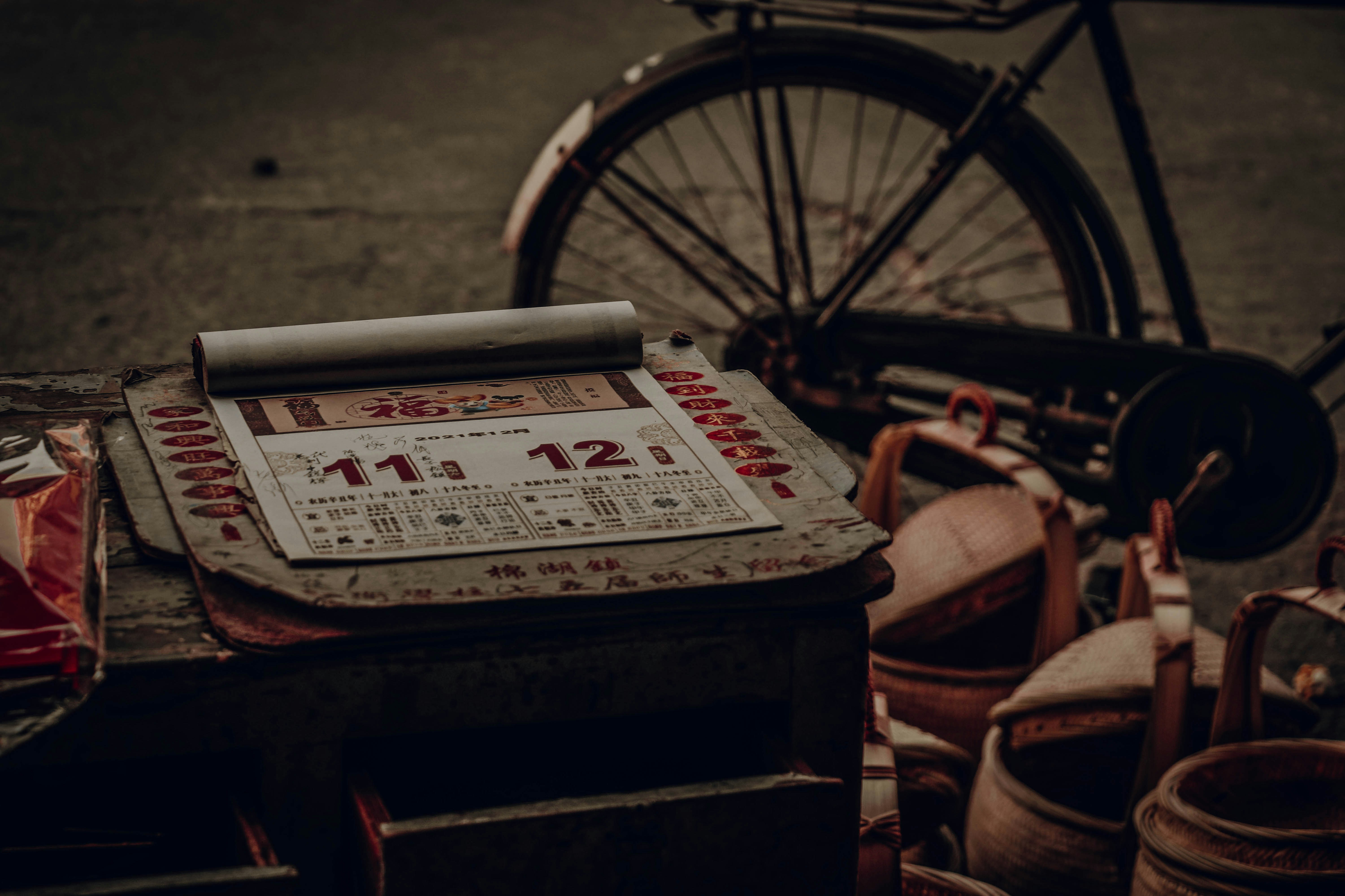 a bike is parked next to a box