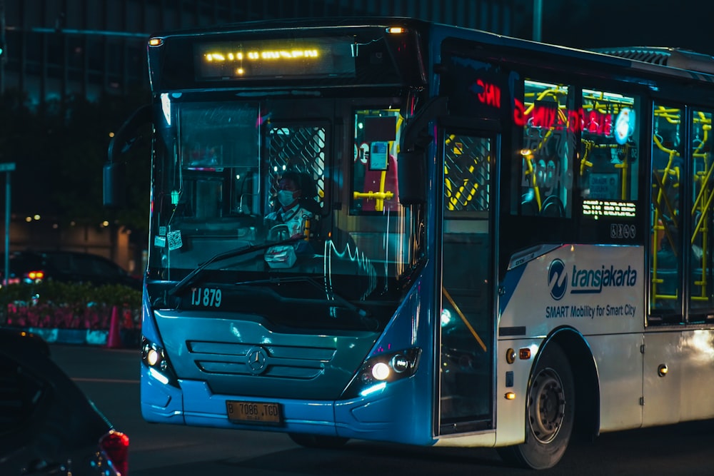 a bus travels down the street