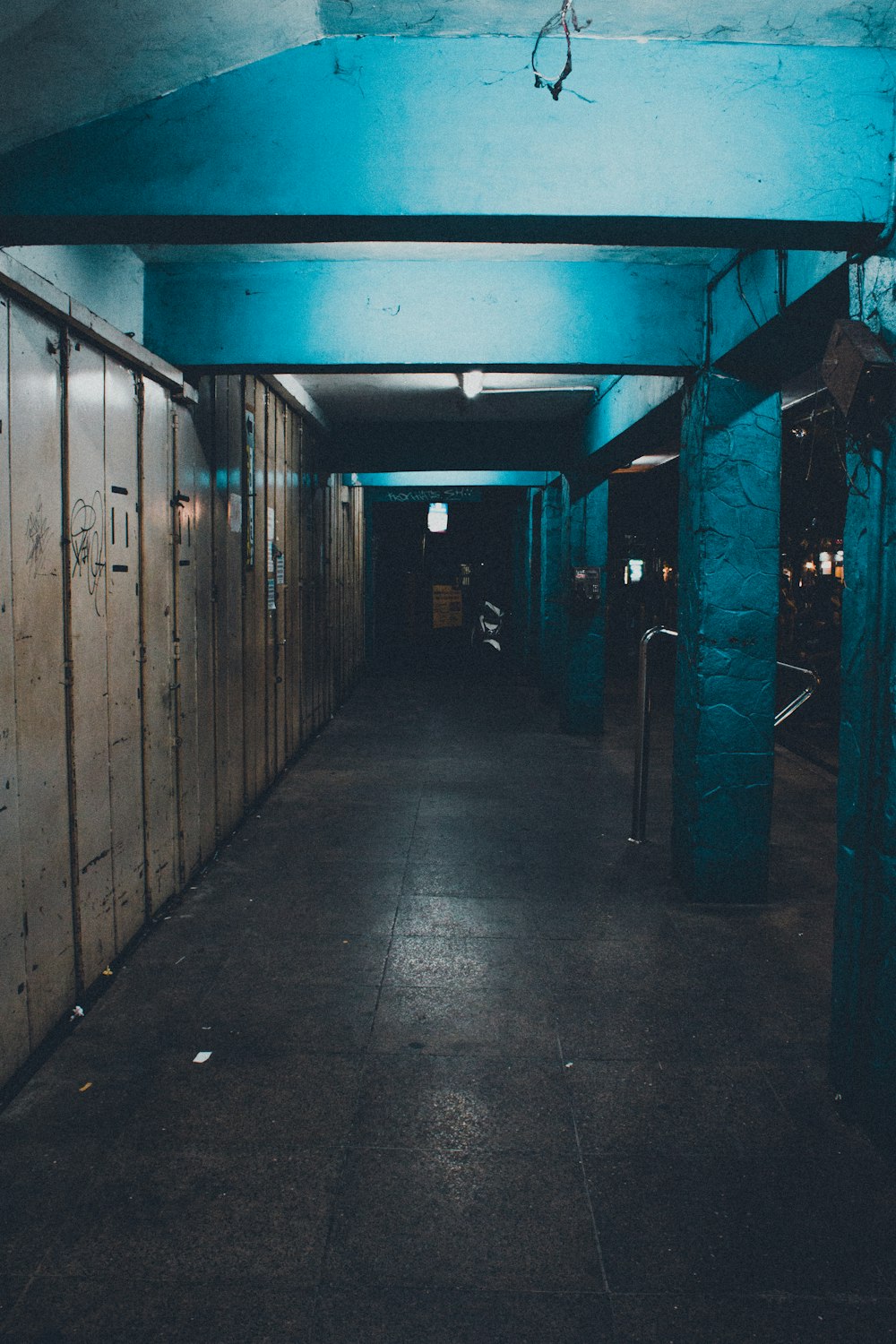 a person walking through a hallway