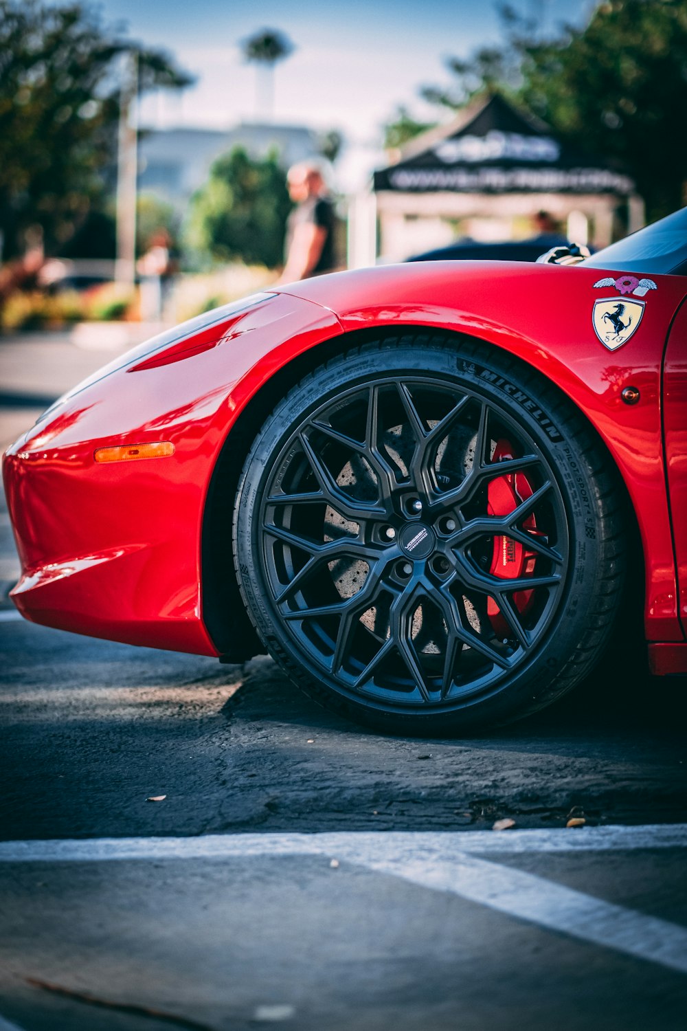 a red car with a black rim