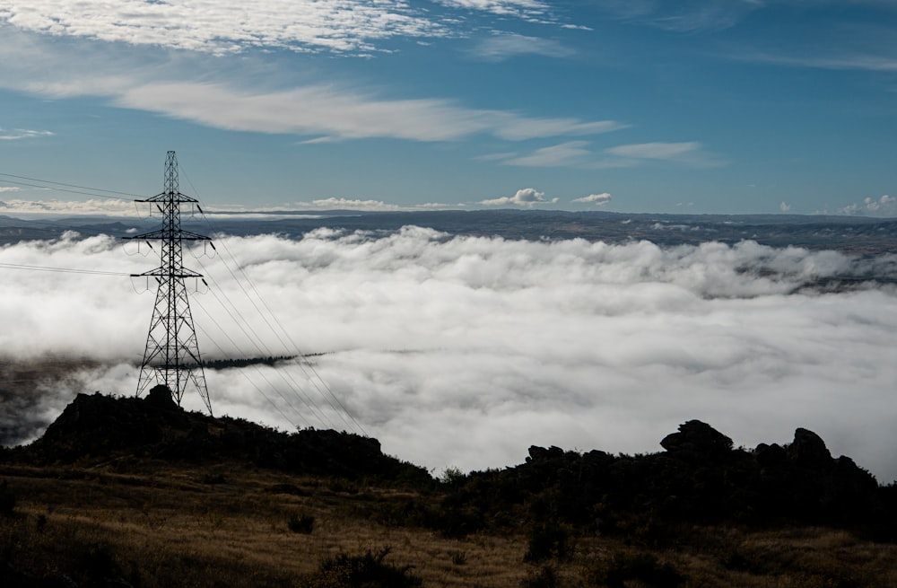 a power line tower on a mountain