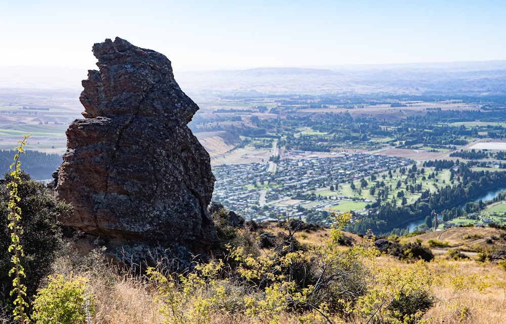 a large rock on a hill