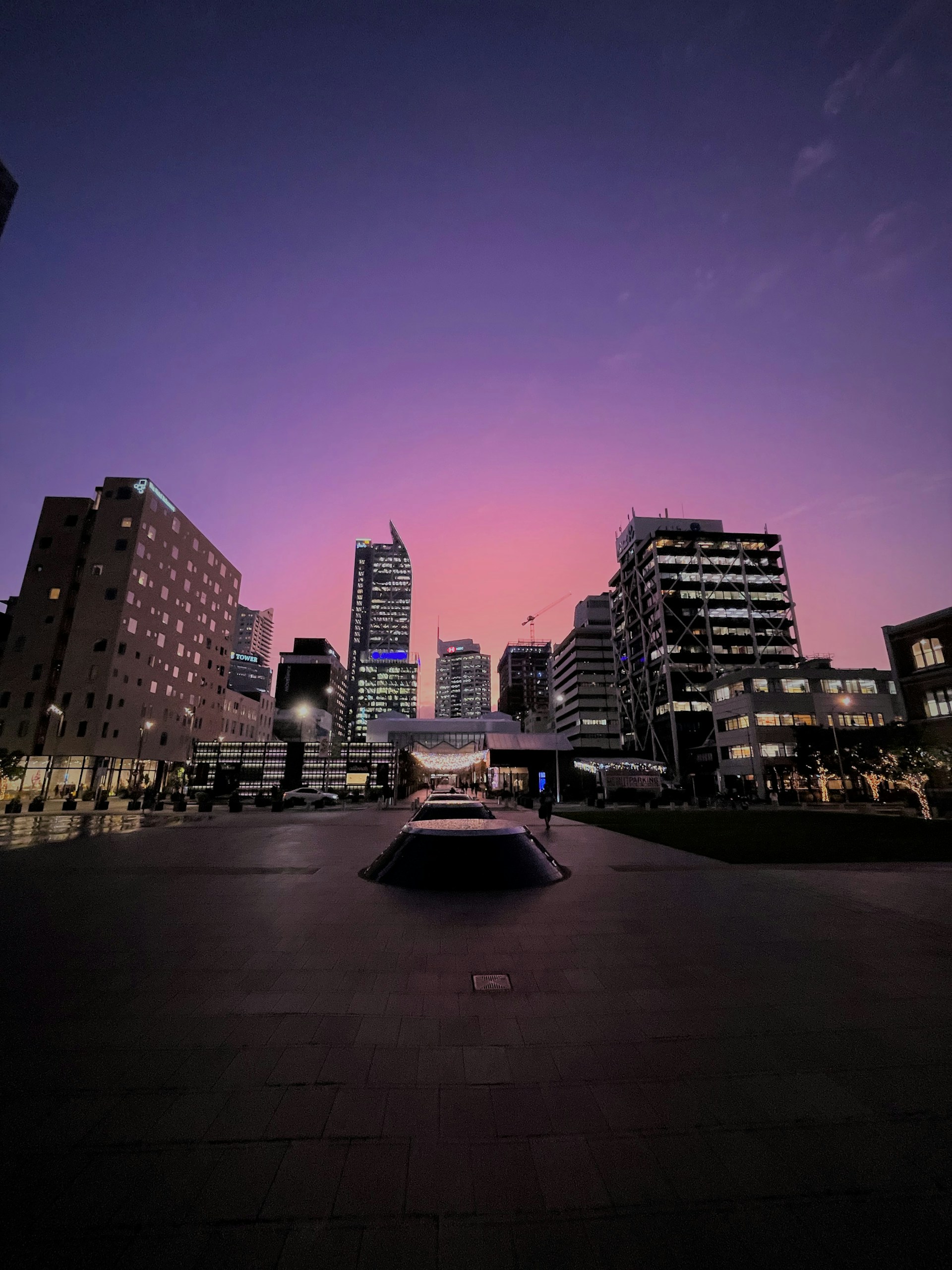 woman wearing yellow long-sleeved dress under white clouds and blue sky during daytime