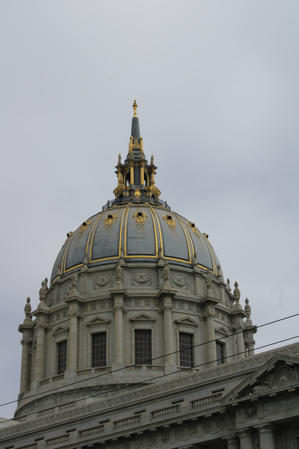 a domed building with a gold roof