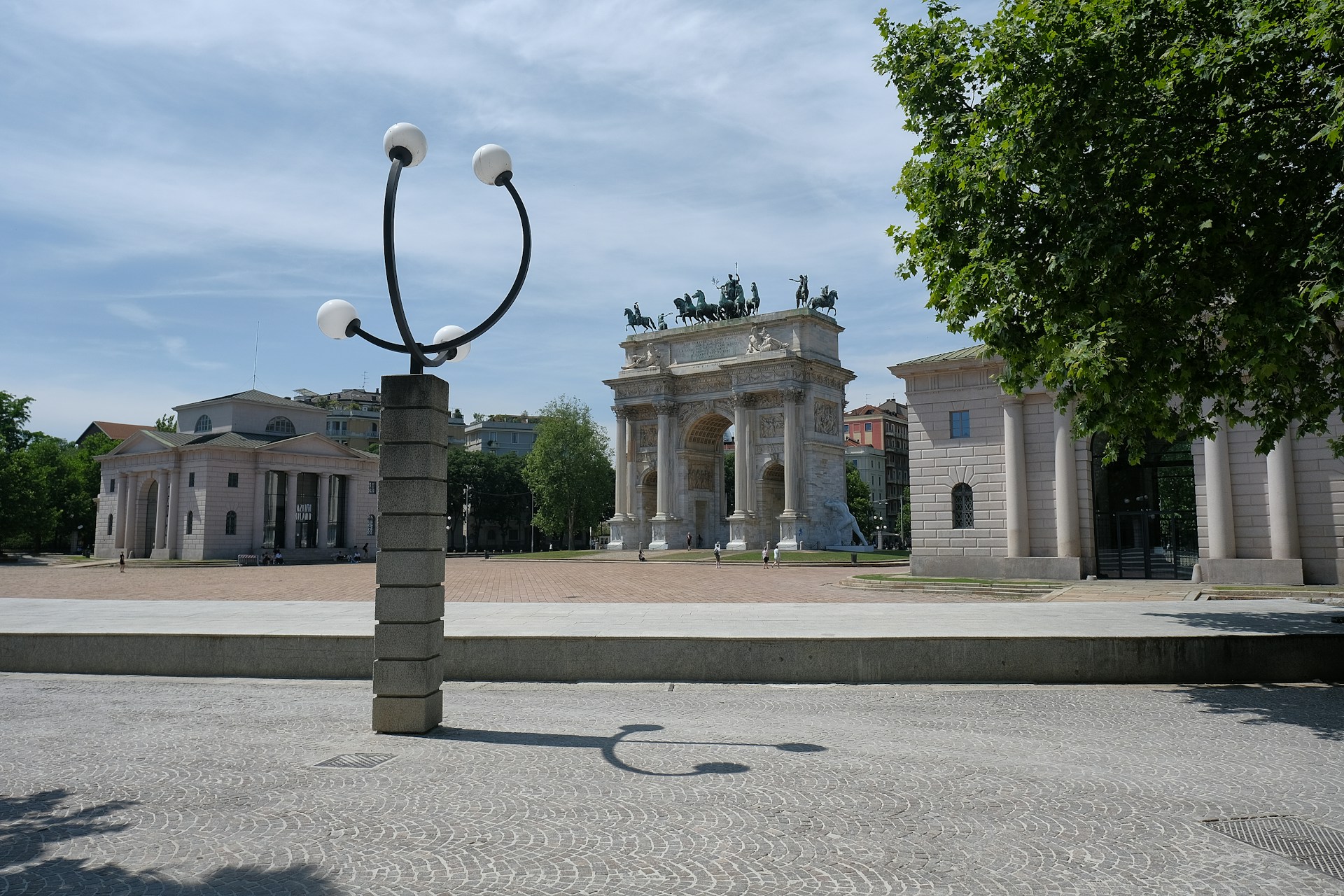 a large building with a statue in front of it