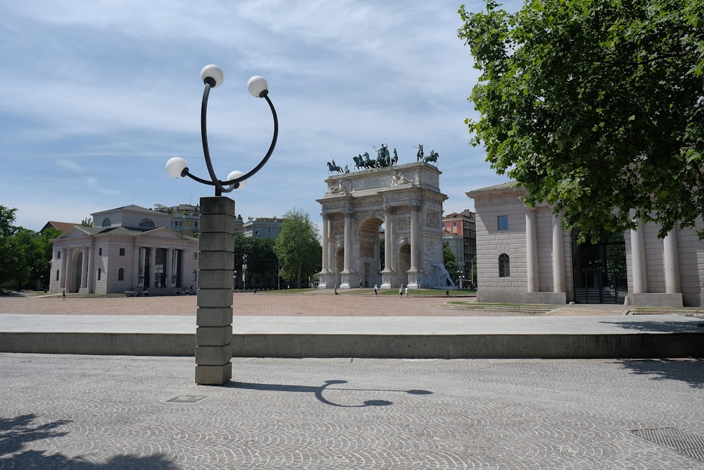 a large building with a statue in front of it