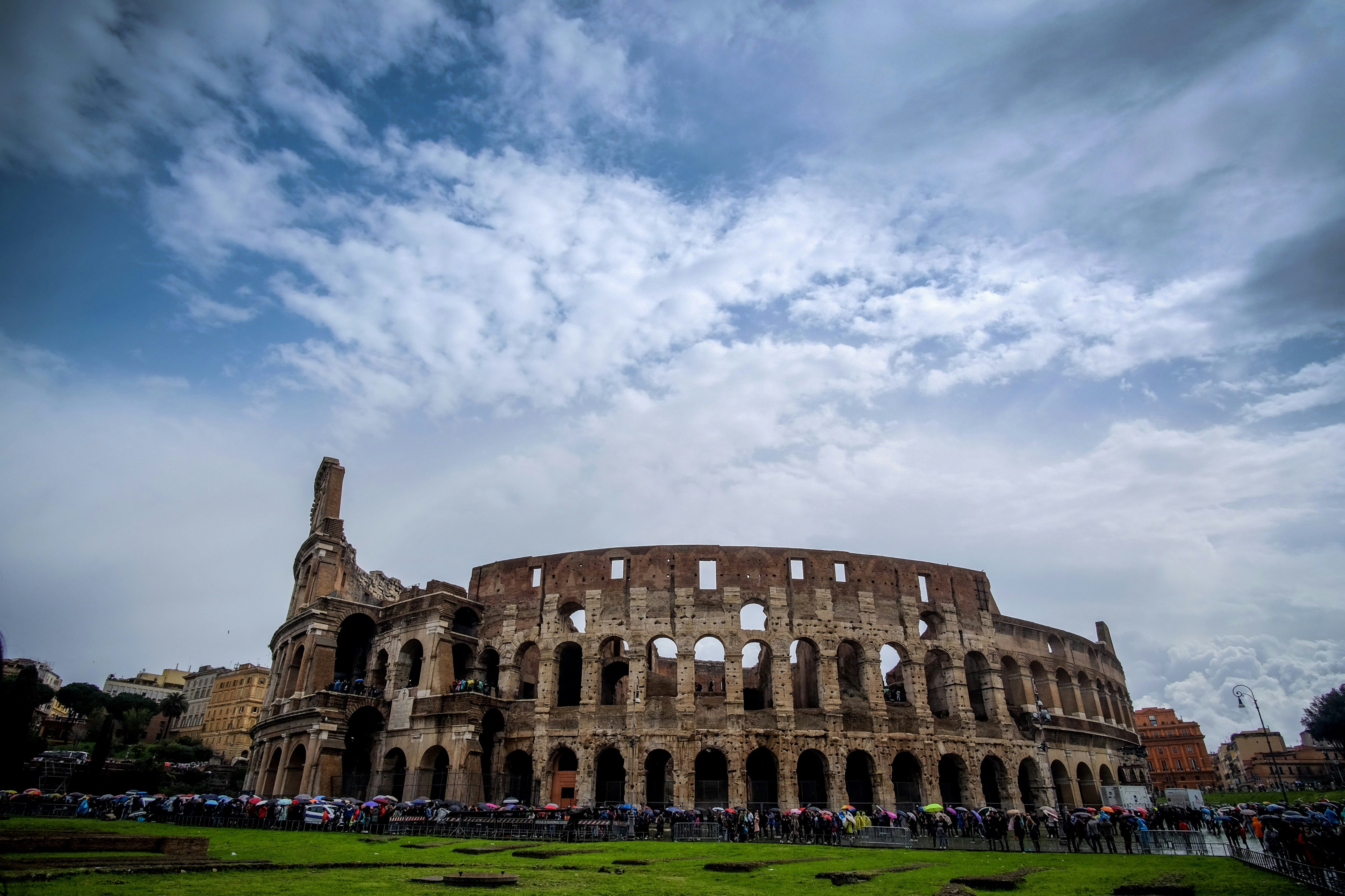 a large stone building with many arches