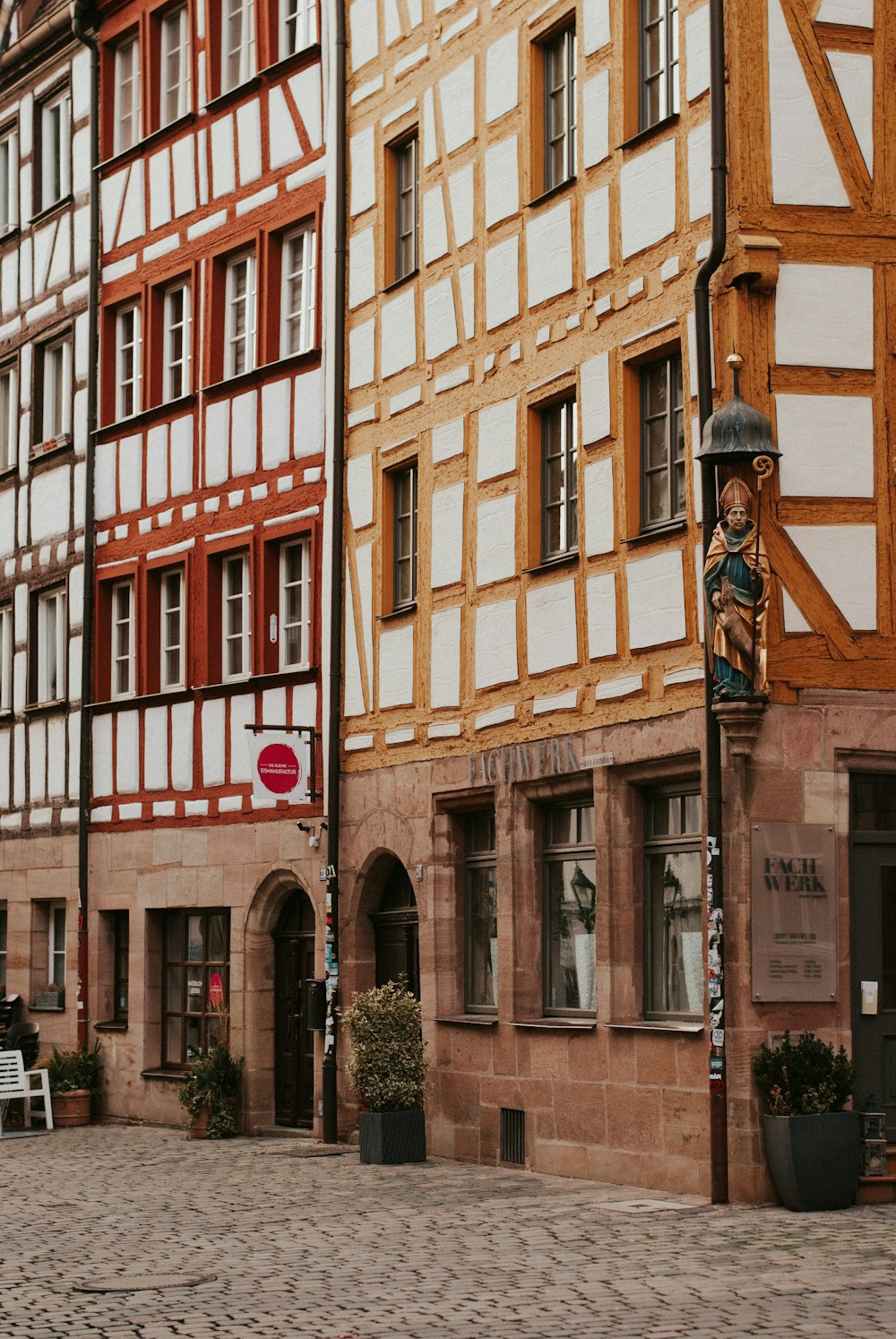 a statue in front of a building