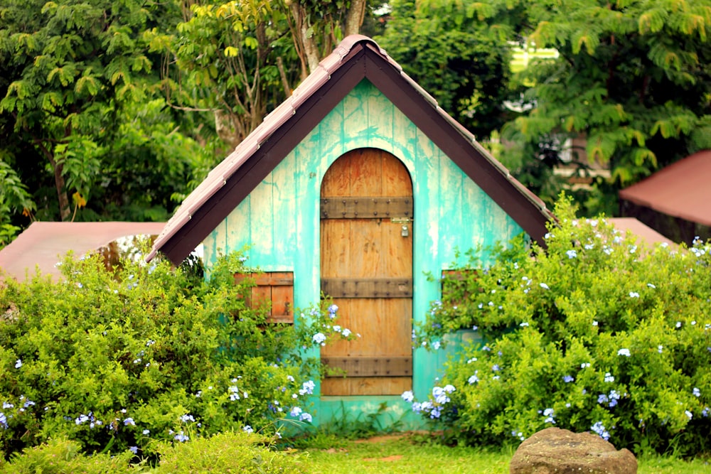 a small blue shed