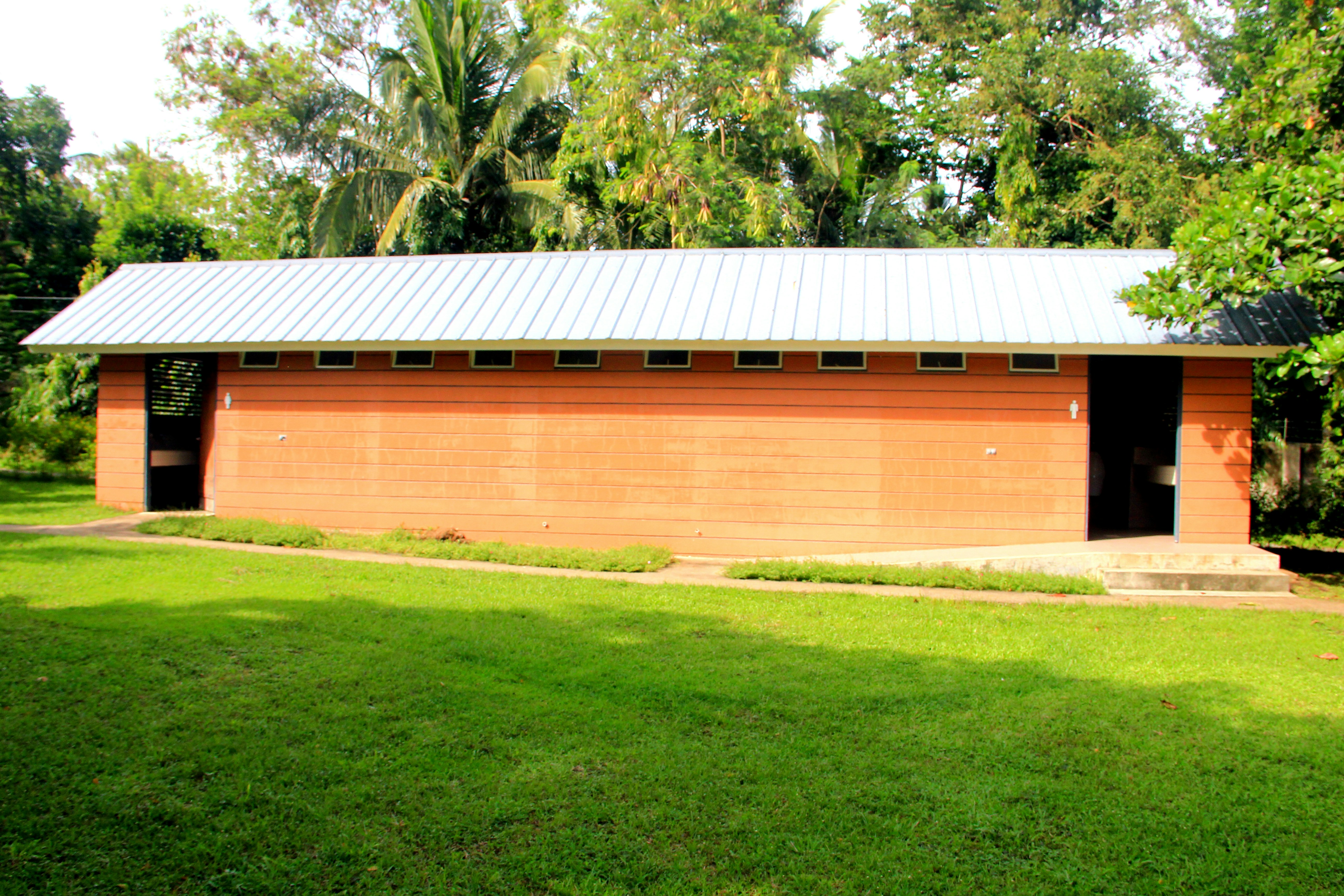 a building with a grass lawn