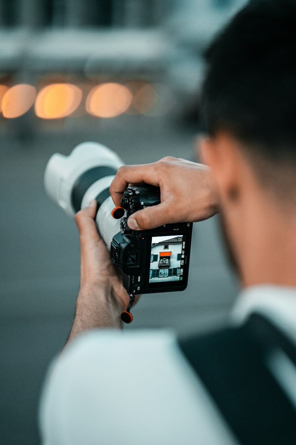a man holding a camera