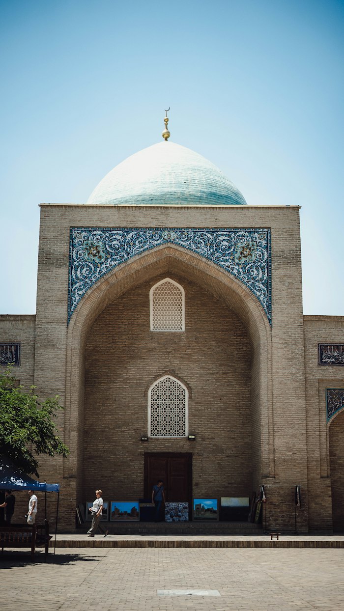 Dating app in Uzbekistan — Tashkent building representing AimerWorld's growing local member base