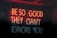 Neon signs display the motivational quote 'Be so good they can't ignore you' in a combination of red and white lights against a dark background.