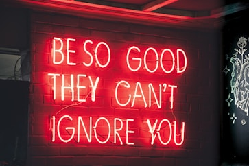 a sign with red text