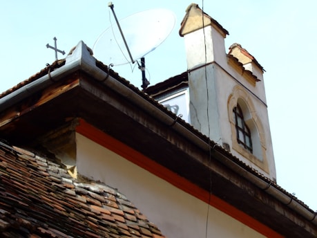 a satellite dish on top of a building