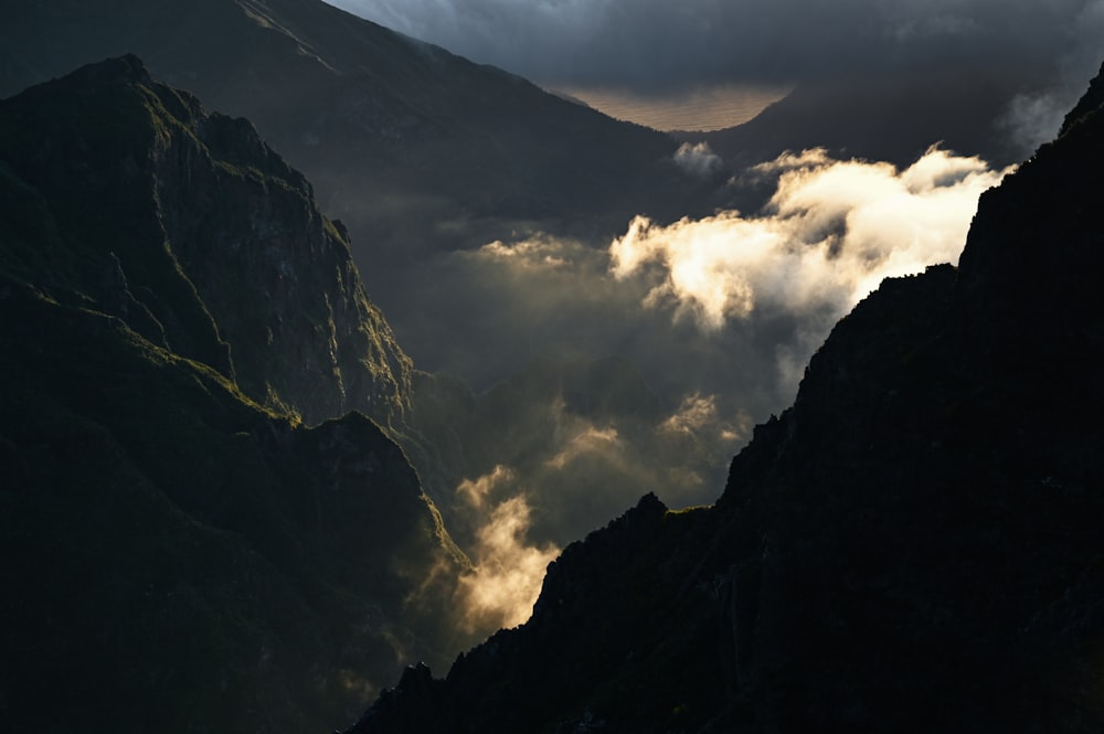 a view of the mountains and clouds