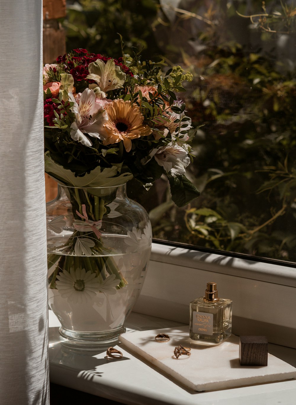 a vase of flowers on a table