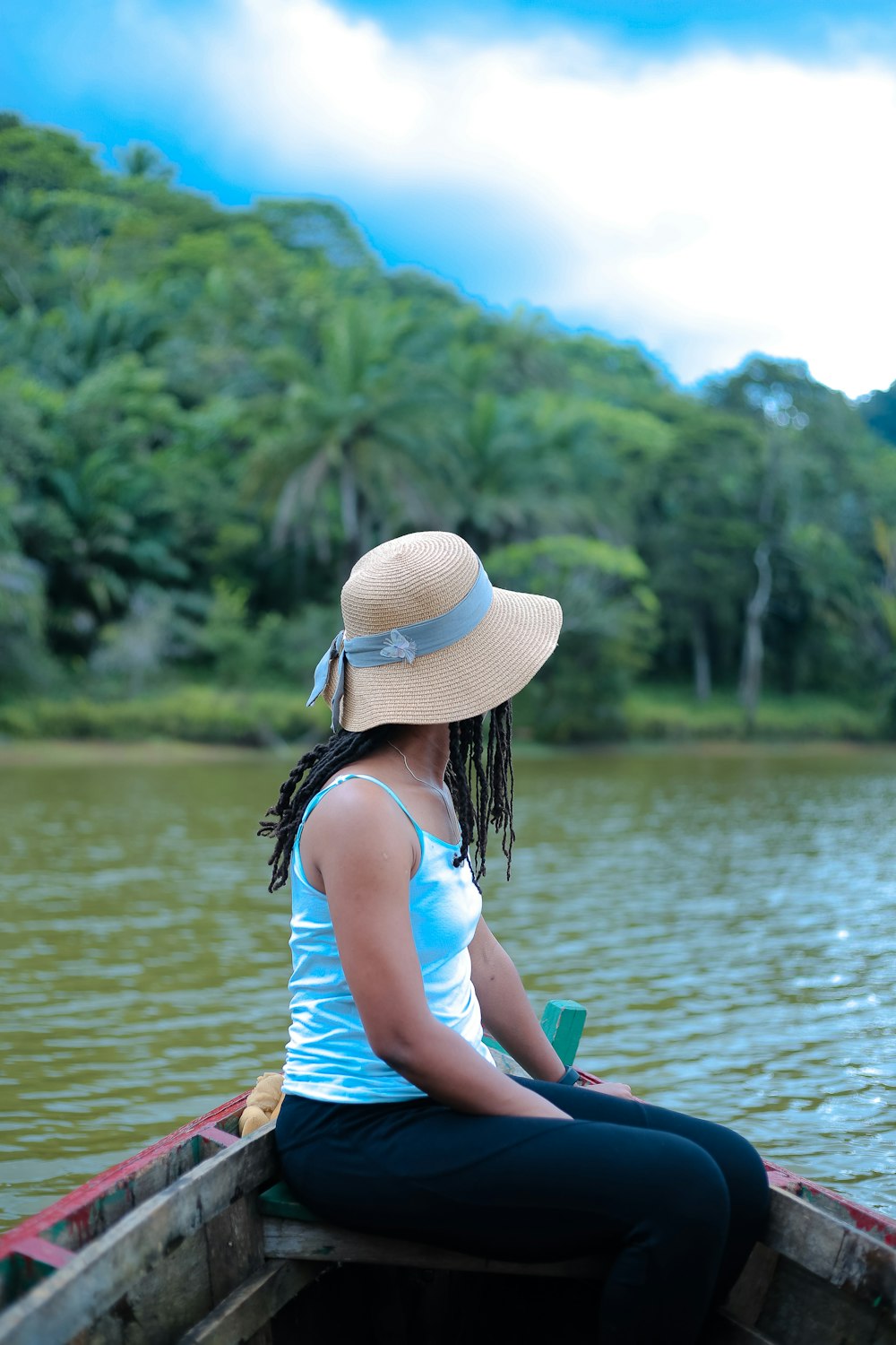 a woman sitting on a boat