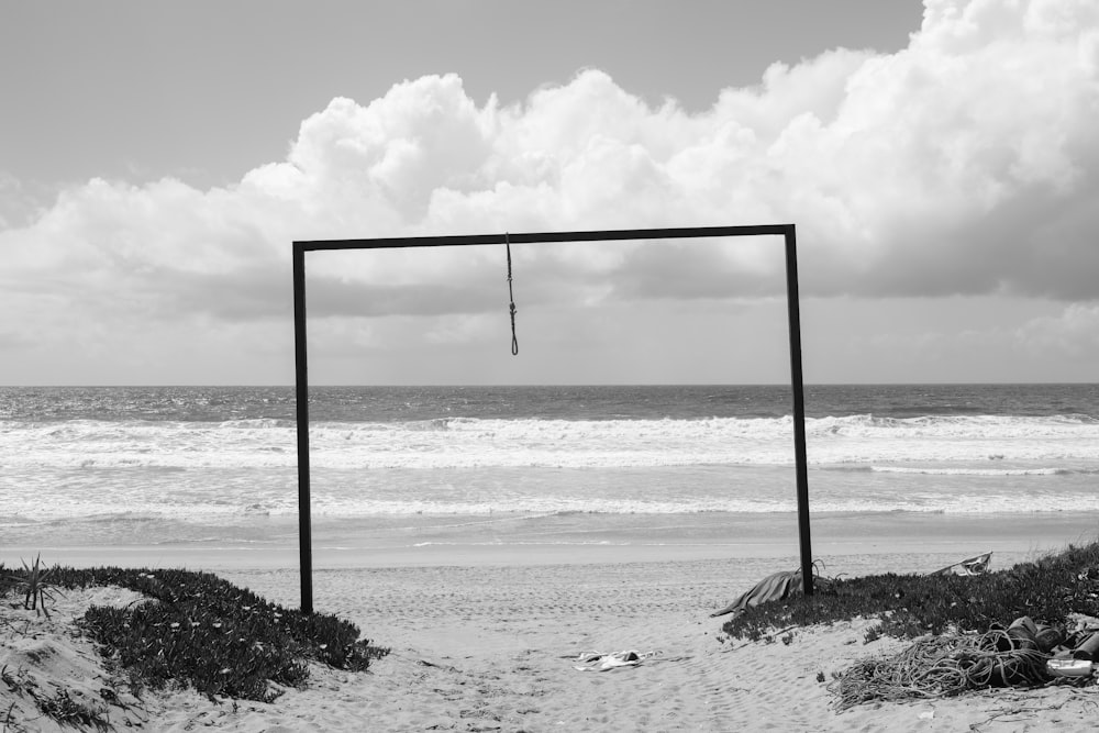 a beach with a lifeguard stand