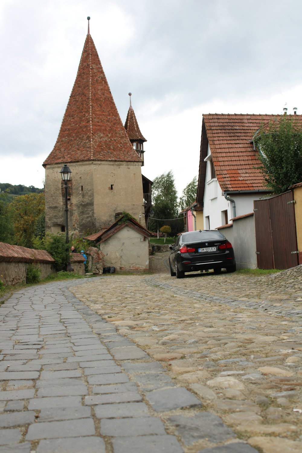 a car parked in front of a church