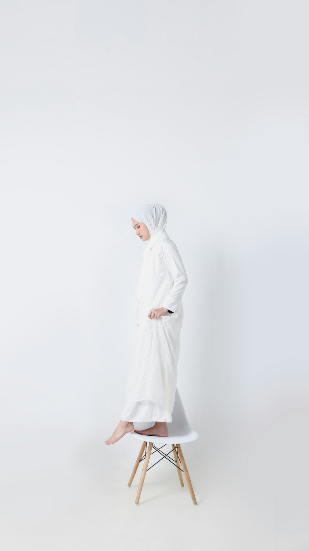a person in a white robe