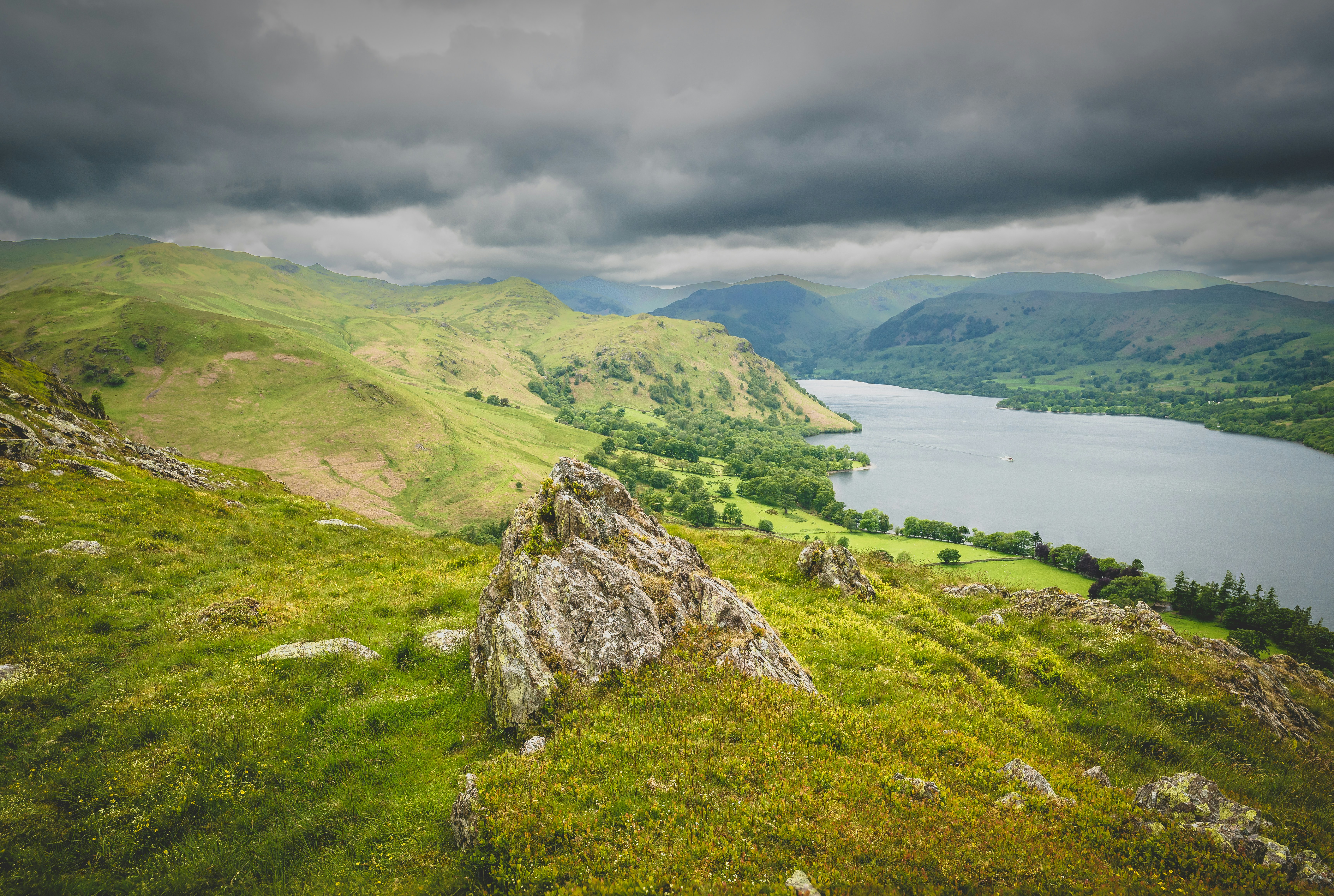 grassy hill of hallin fell overlooking ullswater lake in the lake district