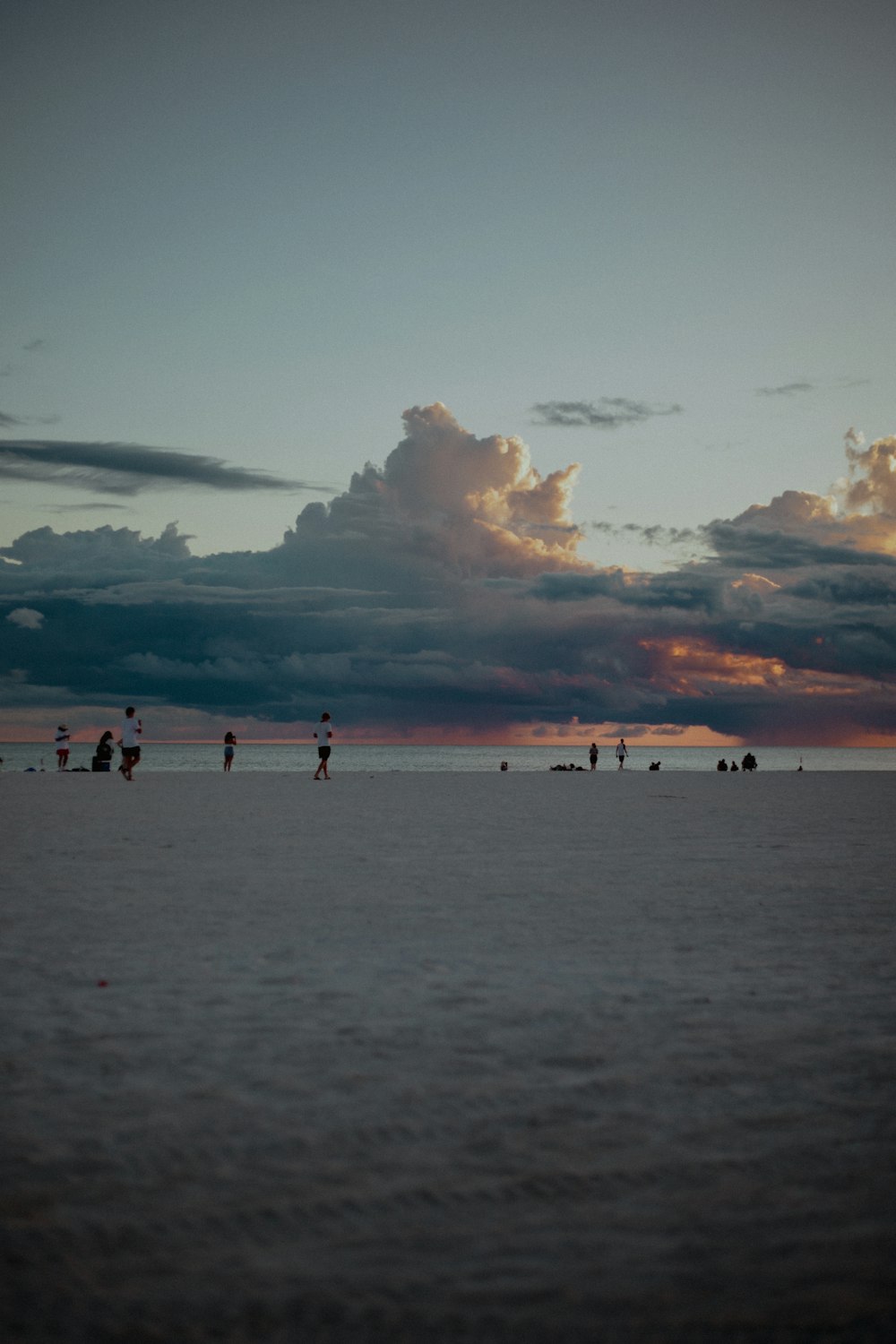 a group of people on a beach