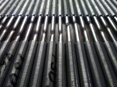 Rows of aluminum parts drying after anodizing surface treatment