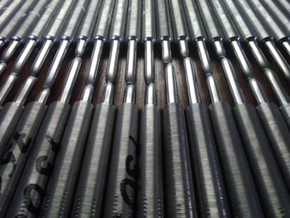 a close up of a row of black bars